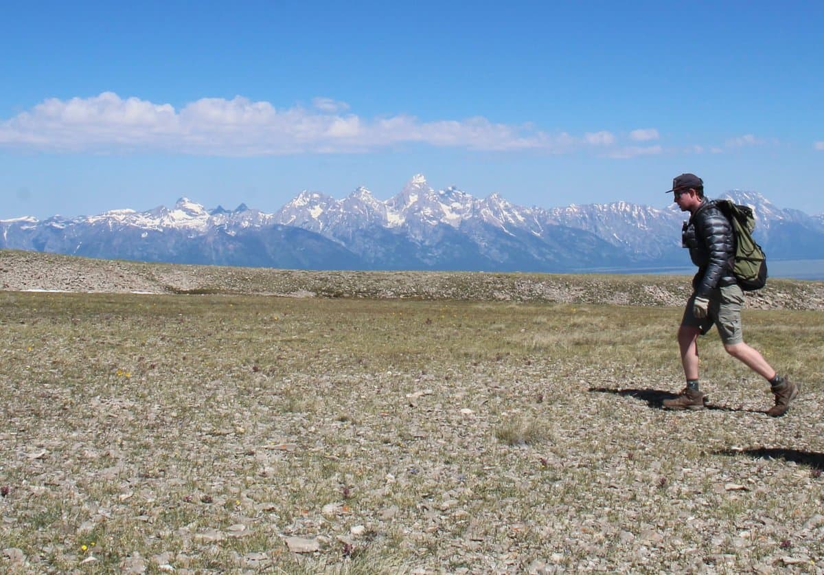 Monty hiking in front of the Teton Range
